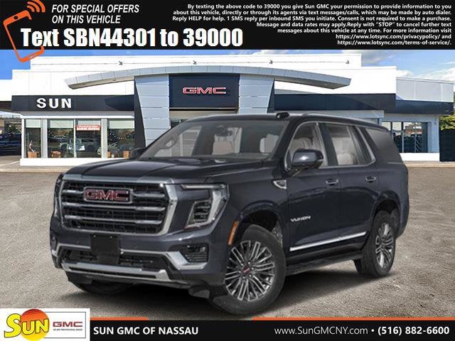 2026 GMC Yukon AT4 Ultimate in Titanium Rush Metallic — front three-quarter view
